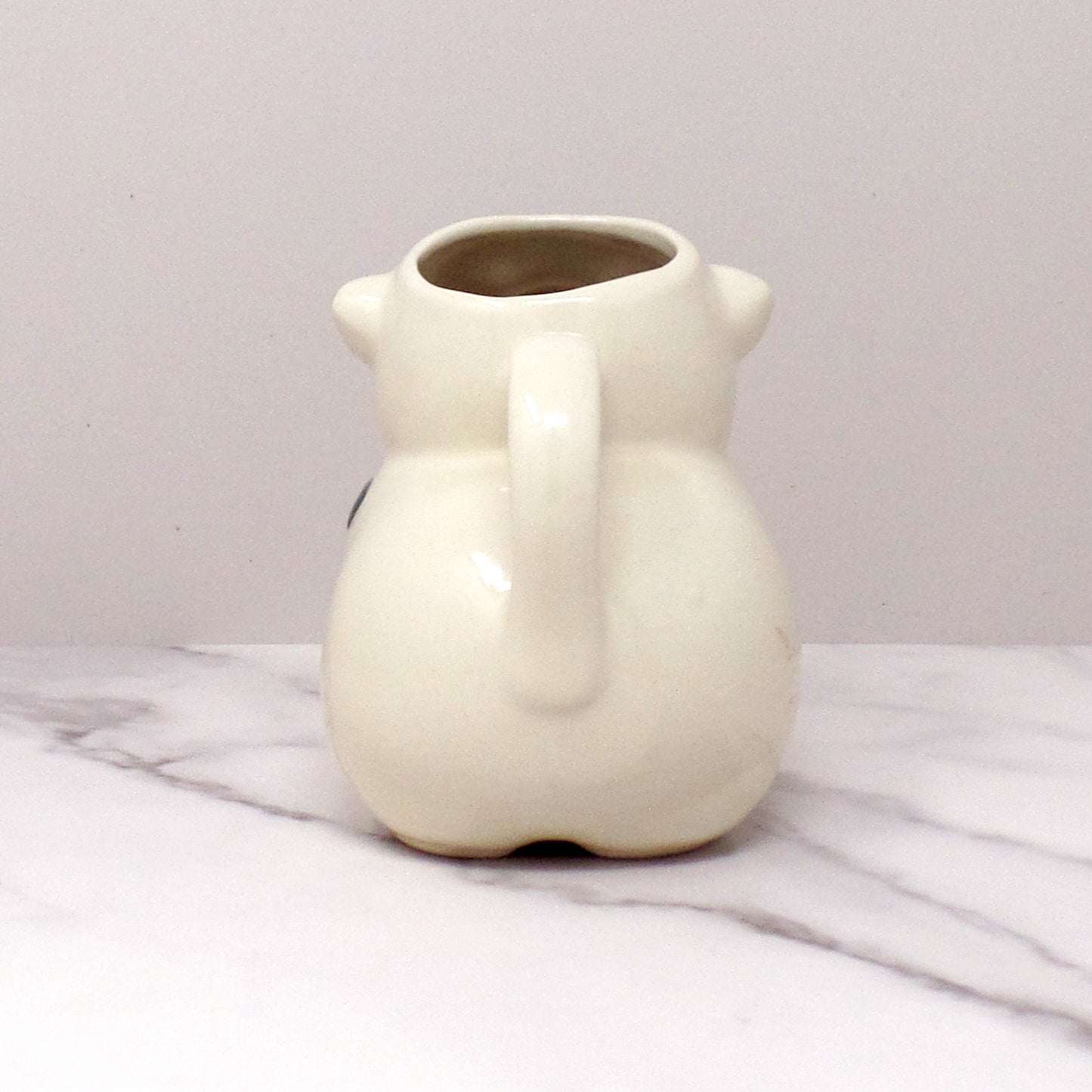 Vintage Shawnee Pottery Smiley Pig Creamer, Peach Flower (1940s-50s)