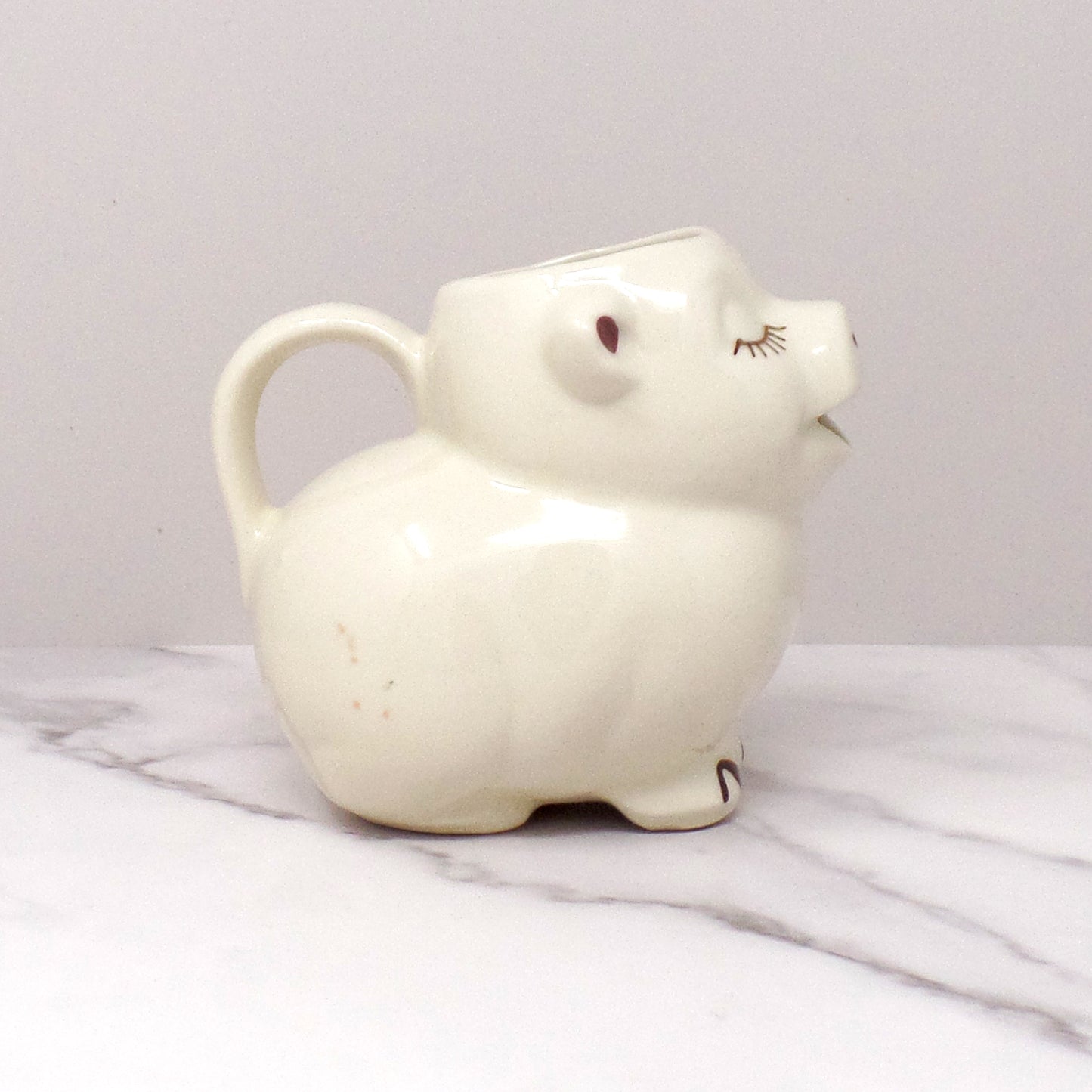 Vintage Shawnee Pottery Smiley Pig Creamer, Peach Flower (1940s-50s)