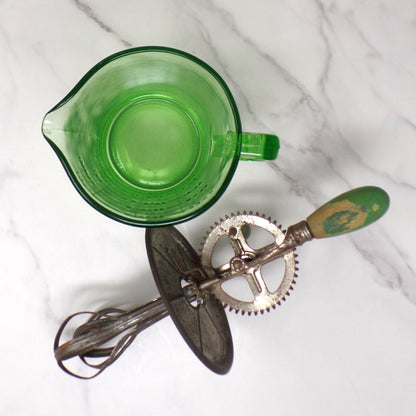 Vintage A & J Green Handled Egg Beater, 4 Cup Uranium Glass (1923)
