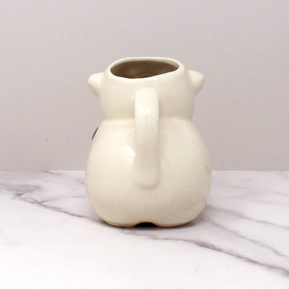 Vintage Shawnee Pottery Smiley Pig Creamer, Peach Flower (1940s-50s)